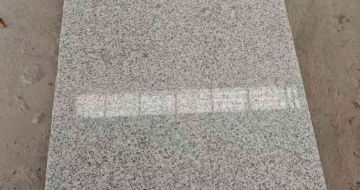 杭州芝麻白光面毛板