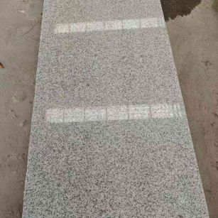 杭州芝麻白光面毛板