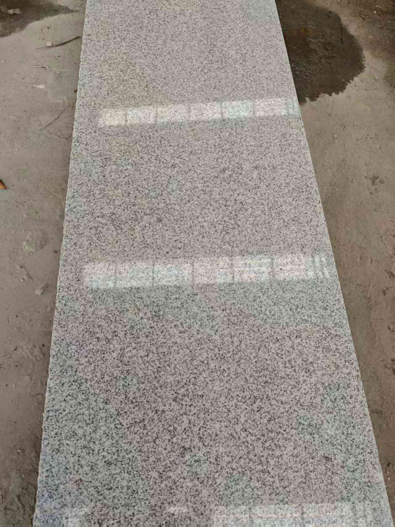 杭州芝麻白光面毛板